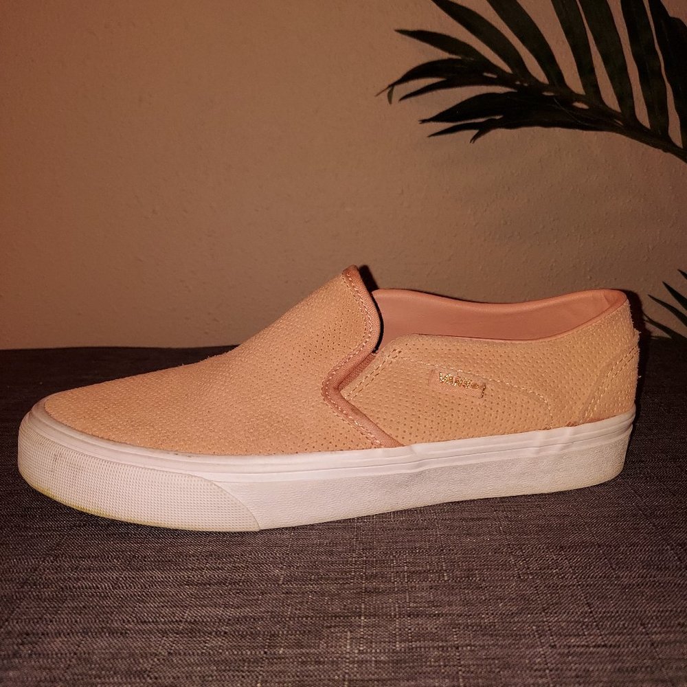 Rose pink, suede slip on Vans.